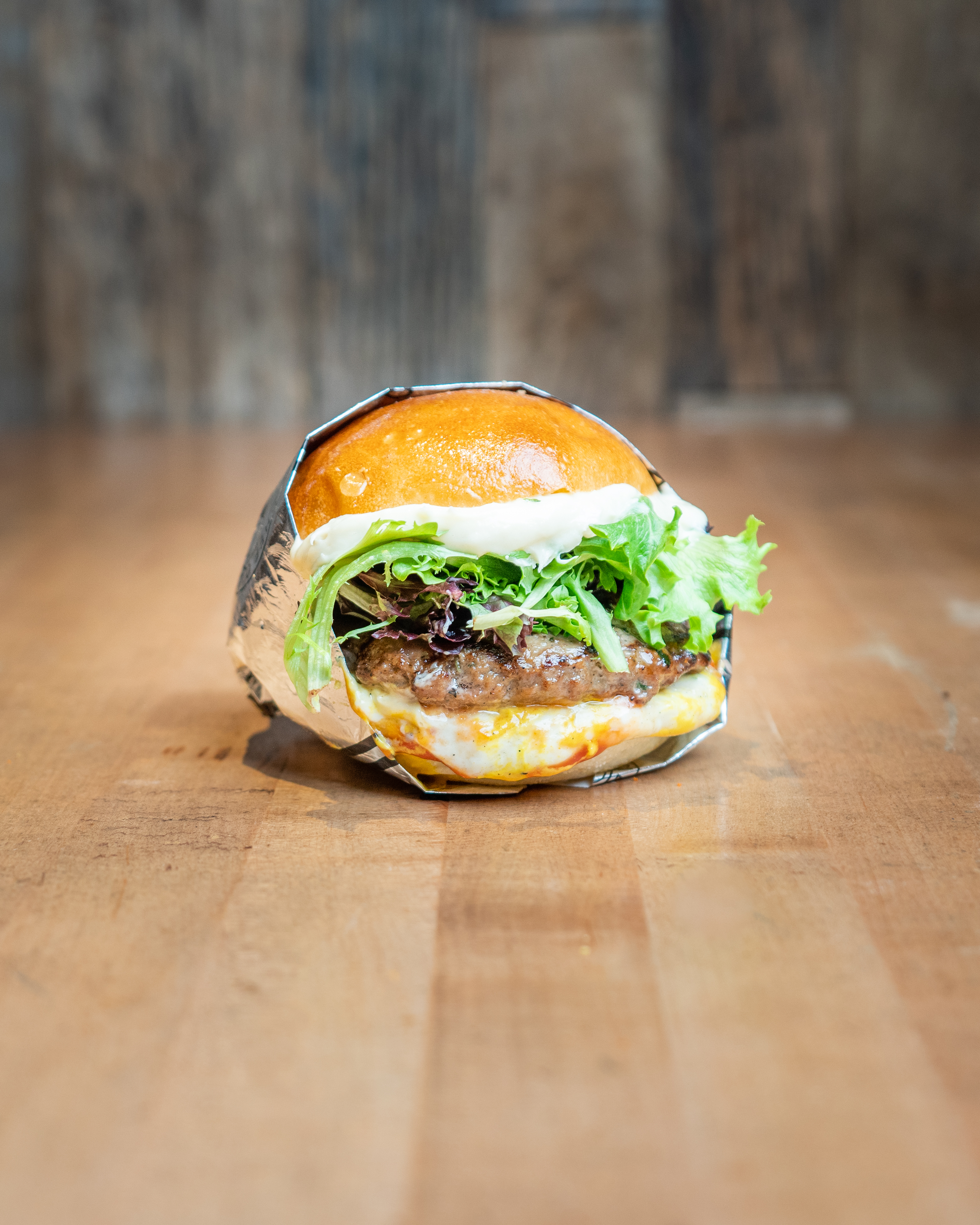 Basic Burger - Fresh 1/3 lb halal beef patty on an Ace Bakery bri...